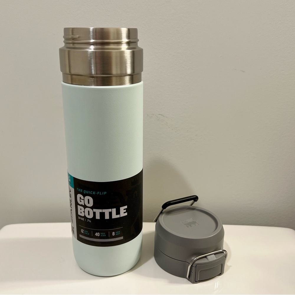 NWT Stanley 24oz Tumbler The Quick Flip Go Bottle in Limited Edition Glass Blue